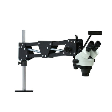 Complete spring model stereo microscope system mounted on fully extended articulated spring arm stand.
