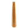 An isolated vertical view of a hexagonal Durston wooden forming mandrel with its distinct clean-cut angles.