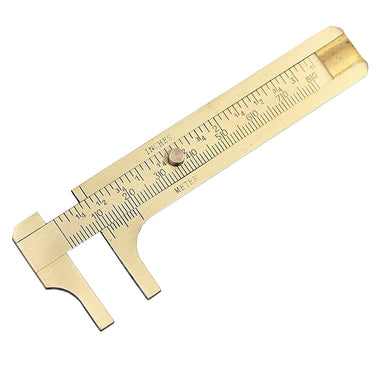 Overhead view of a fine brass vernier caliper tool with its measuring jaws extended to display metric increments.