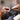 Close-up view of hands setting a gemstone ring inside the Foredom lighted work chamber.