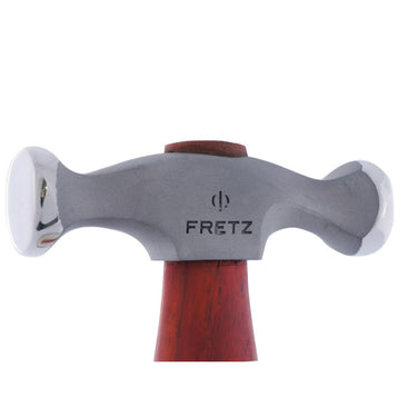 Close-up of Fretz HMR-1 planishing hammer head showing flat and slight dome polished faces.