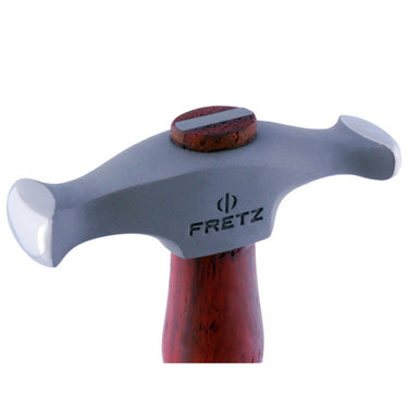 Close-up of Fretz HMR-9 rounded wide raising hammer head showing polished elliptical faces and logo.
