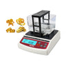 Gold and platinum tester MZ-K150 shown next to illustrative gold rings, bars, and a tiger figurine.