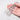 Hand holding three straight Knew Concepts titanium soldering strips over a white marble surface