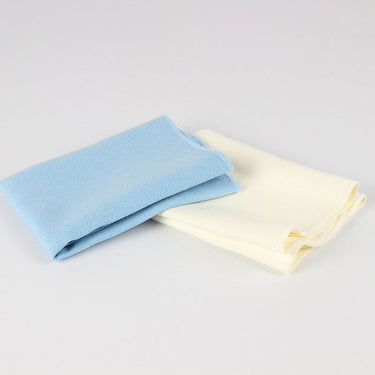 A pair of Korean Diamond Cleaning Cloths in light blue and milky white colors.