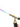 An ORCA Hobby MP99 precision pocket blowtorch in hand ignited and producing a strong blue and purple flame.