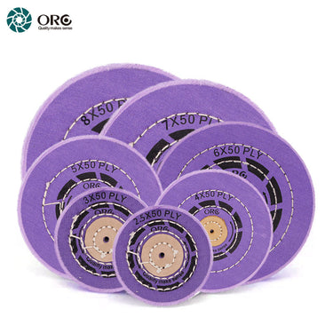 A group of ORO berry purple muslin buffs in various diameters from 2.5 to 8 inches for platinum polishing.