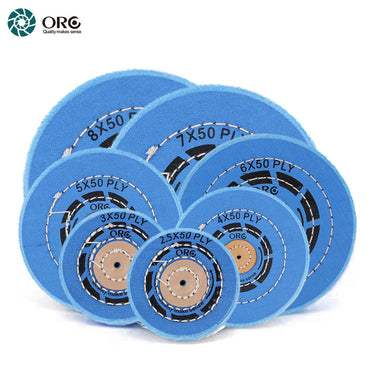 A group of ORO blue muslin buffs in various sizes from 2.5 to 8 inches for platinum scratch removal.