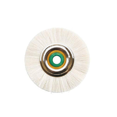 Close-up of a single miniature fine white goat hair polishing brush wheel with a brass and green lined metal center.
