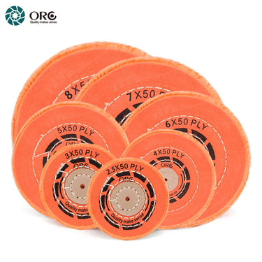 A variety of ORO orange muslin buffs in different sizes from 2.5 to 8 inches for gold jewelry polishing.