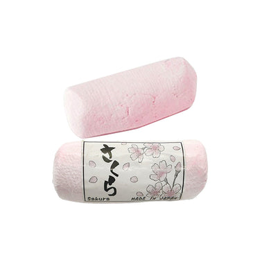 Sakura polishing compound bar showing its smooth pink abrasive paste texture.