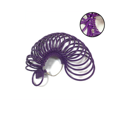 Purple plastic bangle sizing rings on a wire loop with a close-up detail of the connection point.