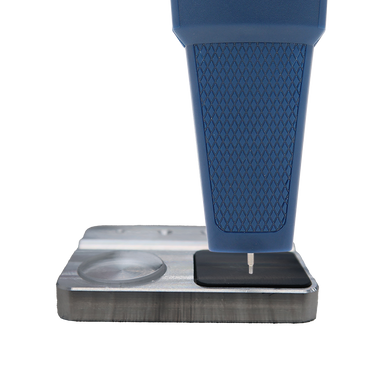 Close-up of Presidium ARi probe tip on the calibration area of its metal base.