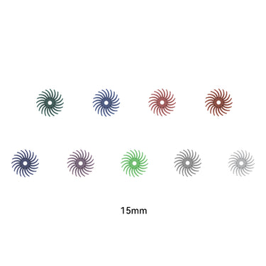 Nine multi-colored 15mm radial bristle discs for jewelry polishing arranged in two rows on a white background