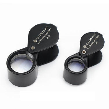 SmartPro Triplet Loupe comparison showing black H10 10X and H14 14X models side-by-side.