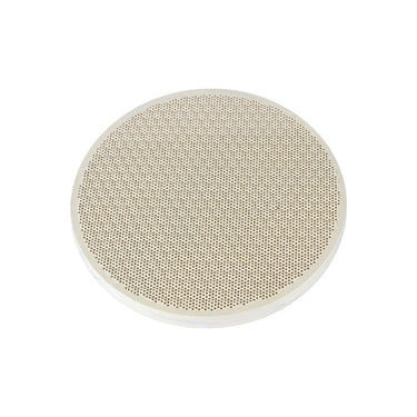 Flat view of a round white ceramic honeycomb soldering block plate without branding on a white background