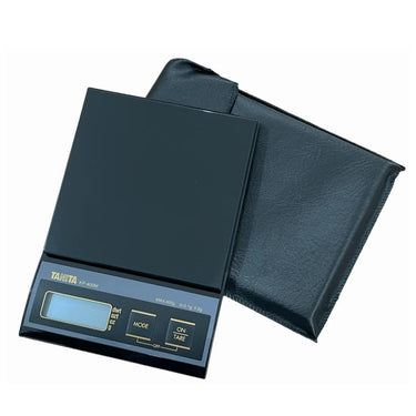 Tanita KP-400M digital scale shown with its included black protective leatherette storage pouch.
