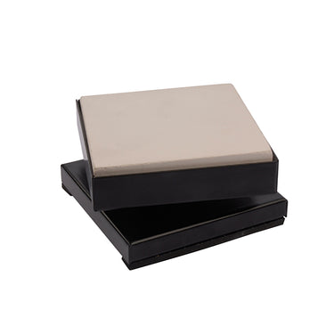Technique ASIC rotating jewelry soldering table with square ceramic block tilted to the left.
