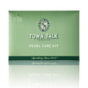 Town Talk Pearl Care Kit in a green, envelope-style sleeve, containing cleaning tissues and a microfibre cloth for pearl jewelry.