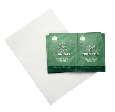 Town Talk Pearl Care Kit sleeve, tissues, and microfibre polishing cloth, laid out for safely cleaning delicate pearls.