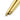 Close-up detail comparing the smooth ball-ends of two golden brass ring sizing mandrels.