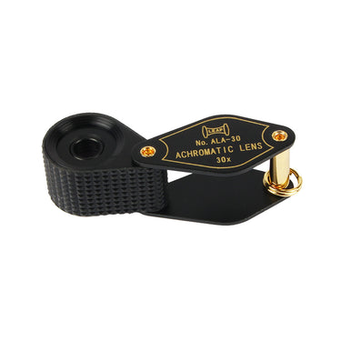 Alfa Mirage 30x loupe shown at an angle to highlight the diamond-textured non-slip grip on the lens housing.