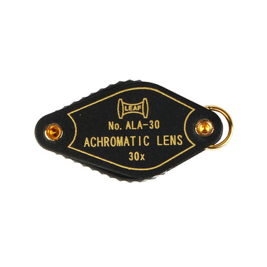 Top view of the Alfa Mirage No. ALA-30 achromatic lens loupe with 30x magnification and gold lettering.