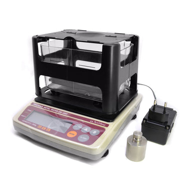Full setup of Alfa Mirage GK-300 precious metal tester with AC adapter and weight.