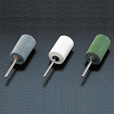 Three Alfa Mirage PVA points (grey, white, green) on a dark textured background, angled.