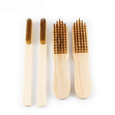 Two narrow straight-handle brass brushes alongside two wide, curved wooden handle brass scratch brushes.