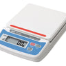 Isometric perspective view of the white and blue A&D HT-500 compact digital scale showing an empty weighing platform.