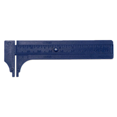 Direct overhead flat lay view of a closed dark blue plastic caliper gauge with dual inch and millimeter scales.