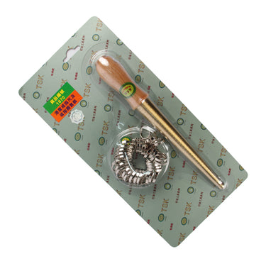 Angled diagonal view of the card-packaged jewelry sizing toolset featuring a brass mandrel and silver finger gauges.