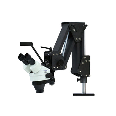 Spring model stereo microscope head with headrest attached to folded articulating spring arm.