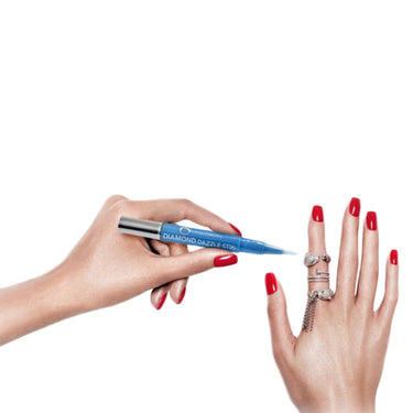 Using the Diamond Dazzle Stik brush tip to clean and polish a diamond engagement ring.