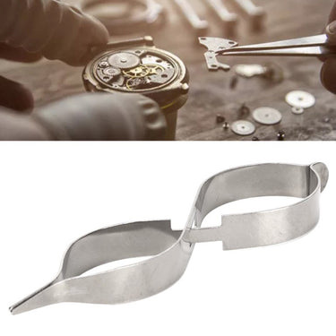 Stainless steel cross locking tweezer shown with a watchmaker servicing a mechanical watch movement.