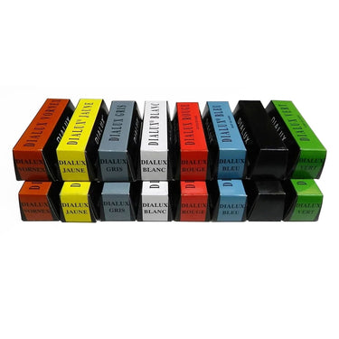 Stacks of multi-color Dialux polishing compound bars in branded paper covers.
