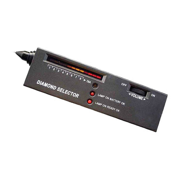 Handheld electronic gem tester showing level indicators and power volume switch dial.