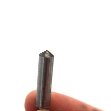 Close-up view of the sharp conical diamond point on the GH697 engraving stylus.