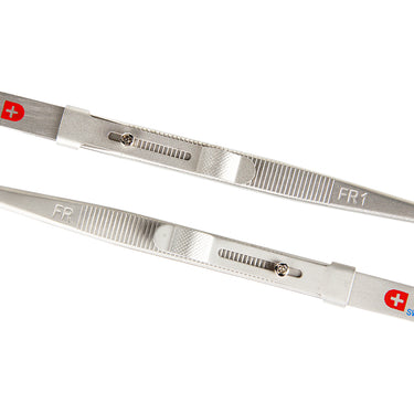 Detailed close-up of the textured slide lock latch and tension screw on gemstone diamond tweezers.