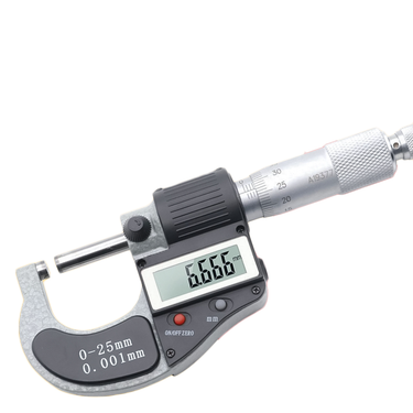 Close-up of the electronic module and digital LCD screen showing a measurement reading in millimeters.