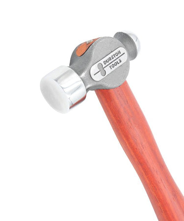 Close-up view of a Durston Tools jobber hammer head highlighting its mirror-polished striking surface.