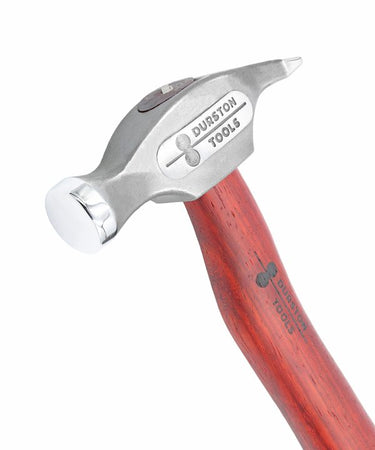 Close-up view of a Durston Tools sledge hammer head showcasing its dual flat striking surface and narrow cross-peen rear.