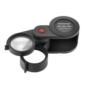 Fully extended Eschenbach achromatic triplet loupe with dual lenses for professional inspection.