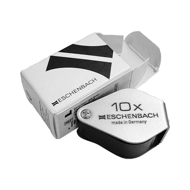 Eschenbach 10X folding jeweler loupe displayed next to its official branded white packaging box.