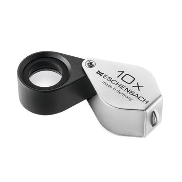 Open Eschenbach 10X Diamond Triplet Folding Magnifier shown from an angled perspective.