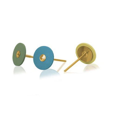 Angled perspective of green, blue, and yellow EVE Diablade diamond polishing wheels for engraving tools.