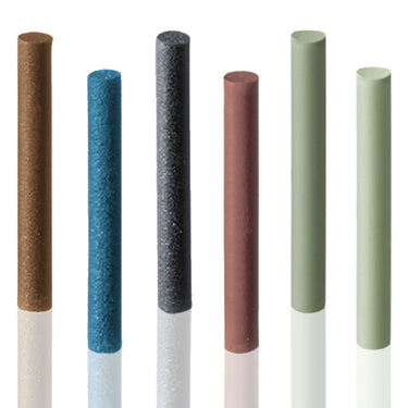 Standing row of colorful EVE Eveflex silicone pins used for precision jewelry and metal polishing.