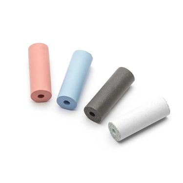 Four unmounted EVE silicone polishers showing the center pin hole for mandrel attachment.