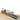 Perspective view of Foredom bur holder arm storing grinding burs above a wooden workbench.